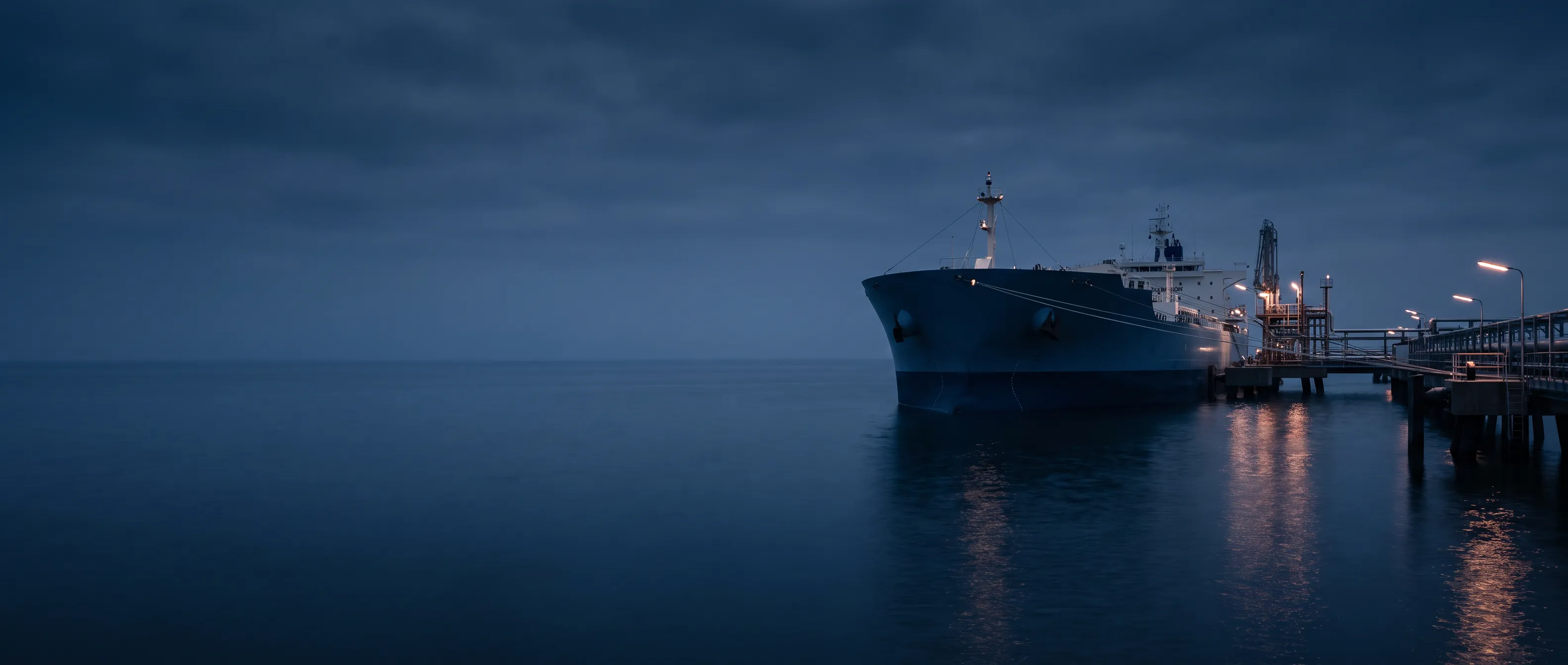 Tanker at an oil terminal in evening light